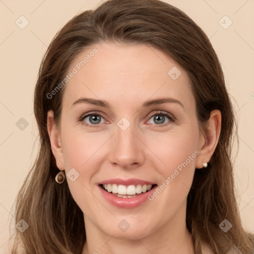 Joyful white young-adult female with long  brown hair and grey eyes