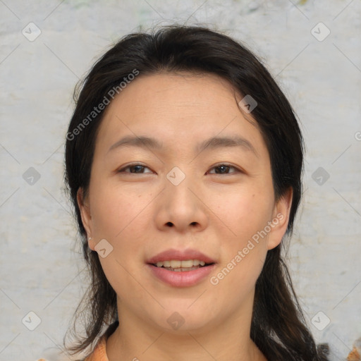 Joyful asian young-adult female with medium  brown hair and brown eyes