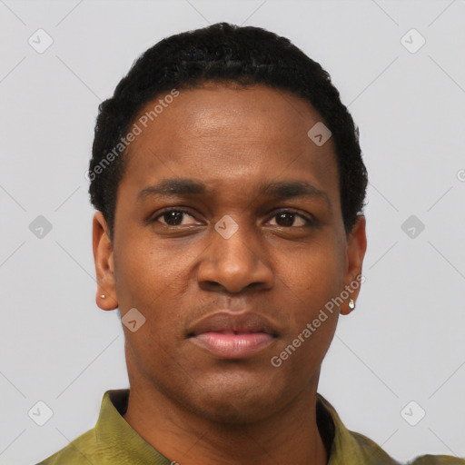 Joyful black young-adult male with short  black hair and brown eyes