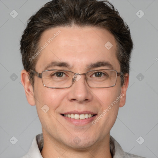 Joyful white adult male with short  brown hair and brown eyes