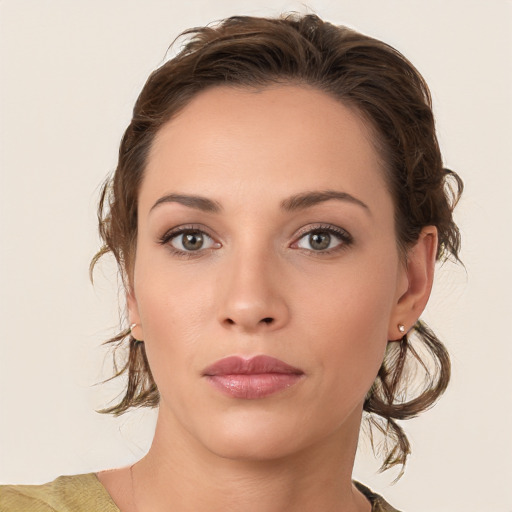 Neutral white young-adult female with medium  brown hair and brown eyes