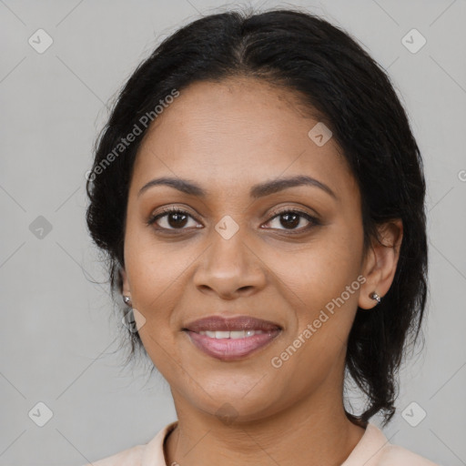 Joyful latino young-adult female with medium  brown hair and brown eyes