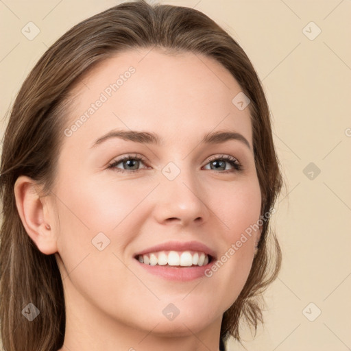 Joyful white young-adult female with long  brown hair and grey eyes