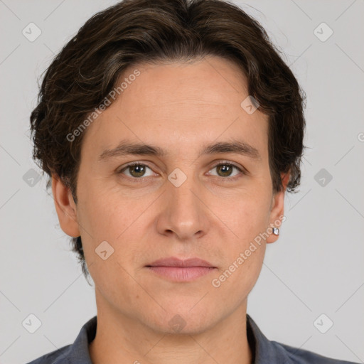 Joyful white adult male with short  brown hair and grey eyes