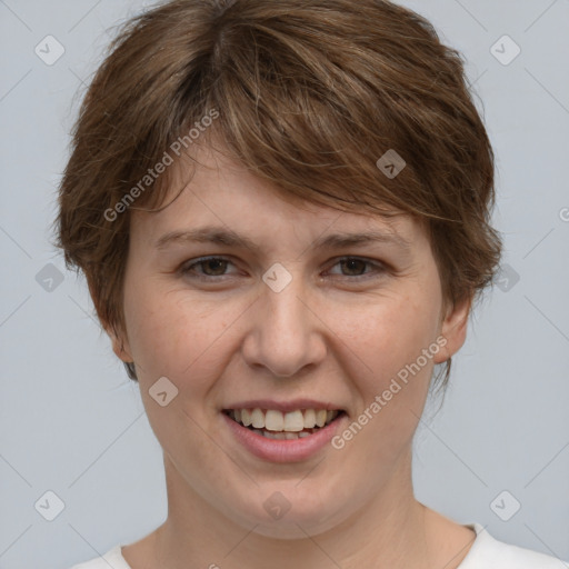 Joyful white adult female with medium  brown hair and grey eyes