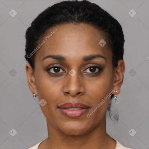 Joyful black young-adult female with short  brown hair and brown eyes