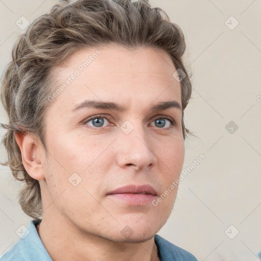 Neutral white young-adult male with short  brown hair and grey eyes