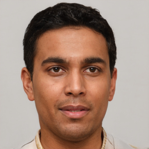 Neutral latino young-adult male with short  brown hair and brown eyes