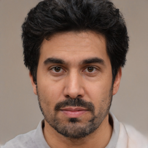 Neutral white young-adult male with short  black hair and brown eyes