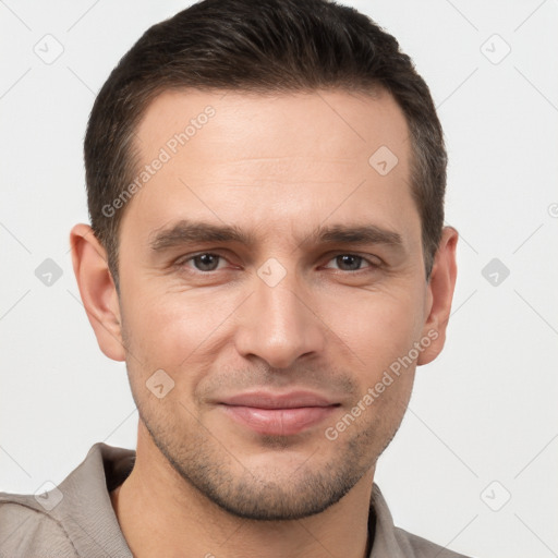 Joyful white young-adult male with short  brown hair and brown eyes