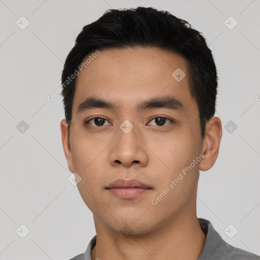 Neutral asian young-adult male with short  black hair and brown eyes