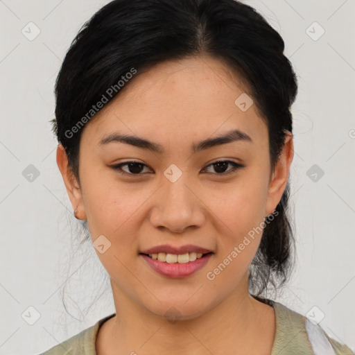 Joyful asian young-adult female with medium  black hair and brown eyes