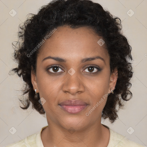 Joyful black young-adult female with medium  brown hair and brown eyes