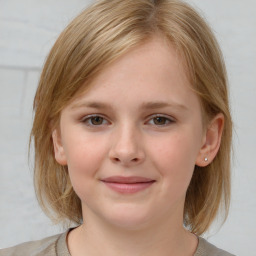 Joyful white child female with medium  brown hair and grey eyes