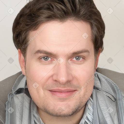 Joyful white adult male with short  brown hair and grey eyes