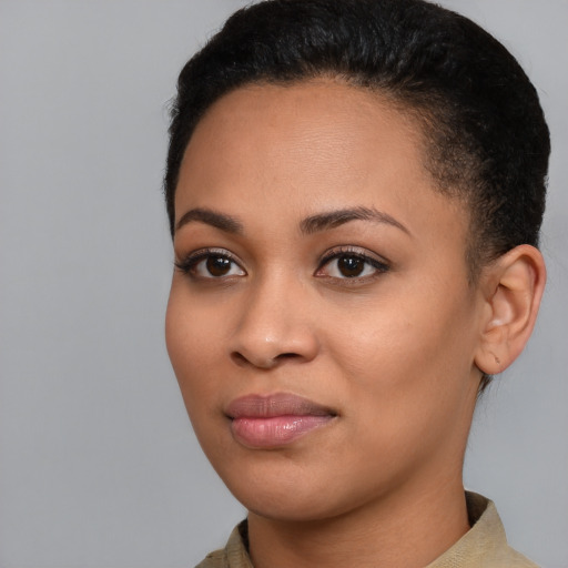 Joyful asian young-adult female with short  brown hair and brown eyes