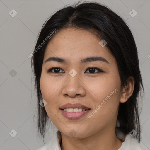 Joyful asian young-adult female with medium  brown hair and brown eyes