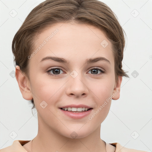 Joyful white young-adult female with short  brown hair and grey eyes