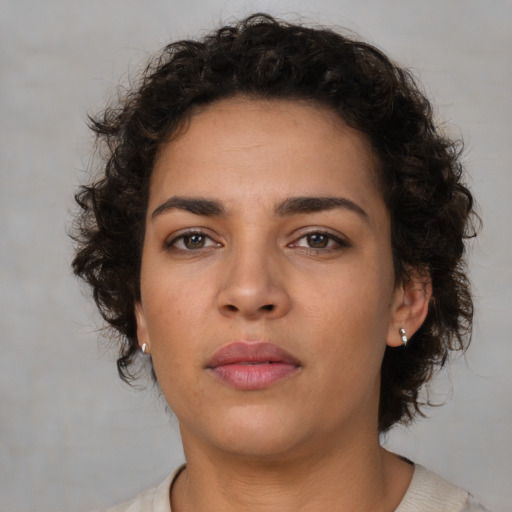 Neutral white young-adult female with medium  brown hair and brown eyes