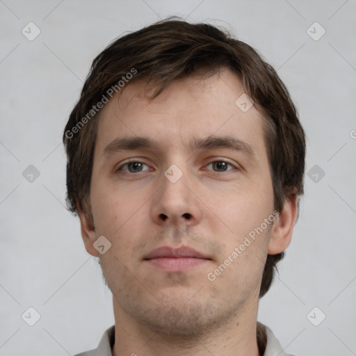 Neutral white young-adult male with short  brown hair and brown eyes