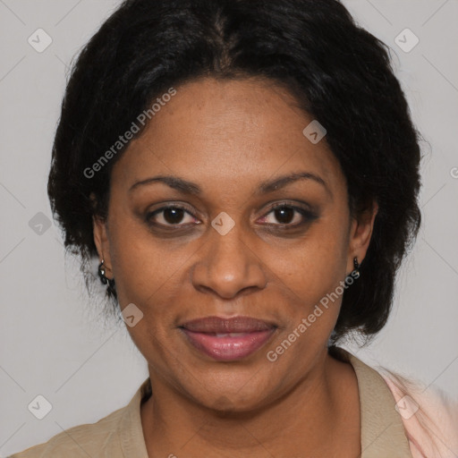 Joyful black adult female with medium  black hair and brown eyes