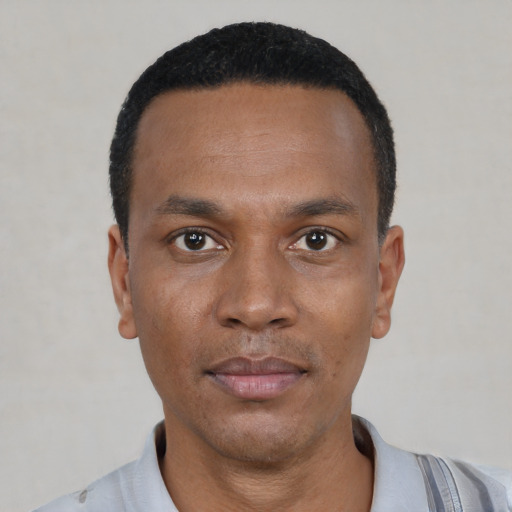 Neutral black young-adult male with short  black hair and brown eyes