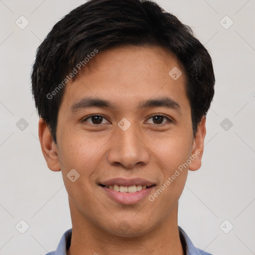 Joyful asian young-adult male with short  brown hair and brown eyes