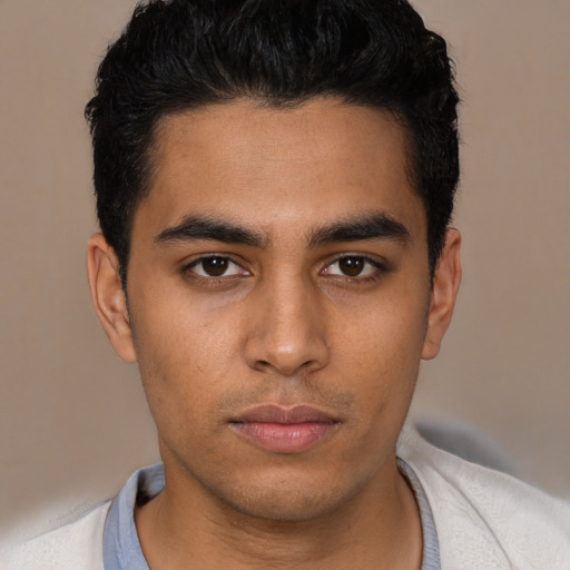 Neutral latino young-adult male with short  black hair and brown eyes