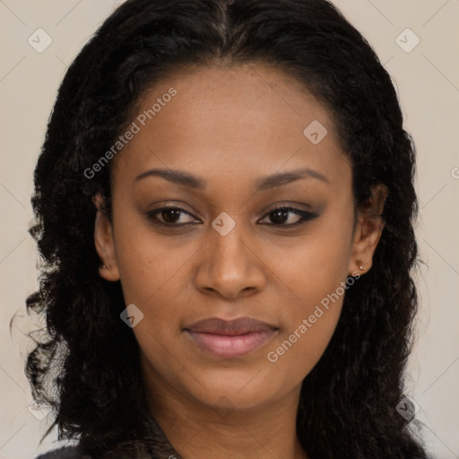 Joyful black young-adult female with long  brown hair and brown eyes