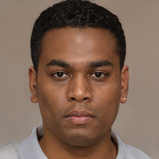 Neutral black young-adult male with short  brown hair and brown eyes