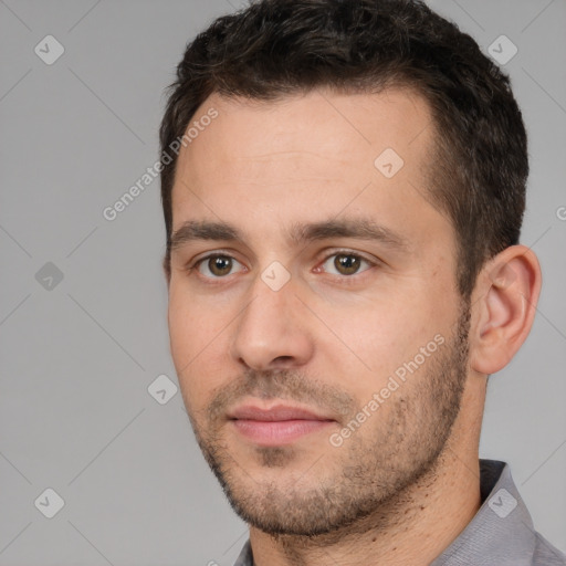 Neutral white young-adult male with short  brown hair and brown eyes