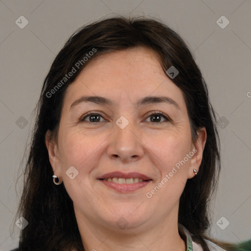 Joyful white adult female with medium  brown hair and grey eyes