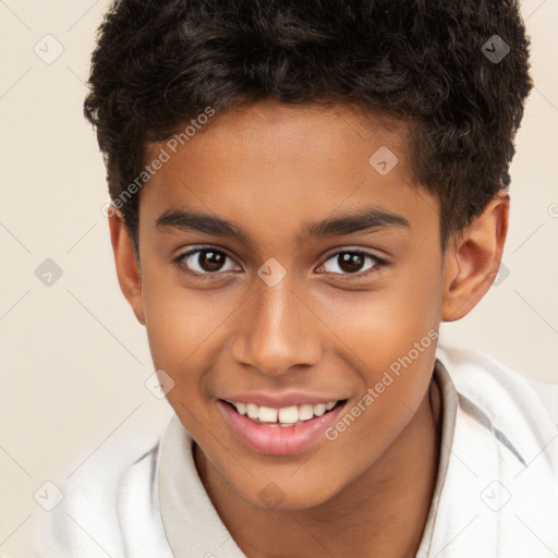 Joyful white child male with short  brown hair and brown eyes