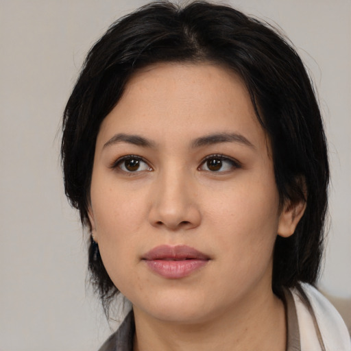 Neutral asian young-adult female with medium  black hair and brown eyes