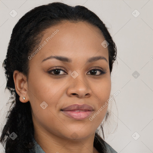 Joyful black young-adult female with long  brown hair and brown eyes