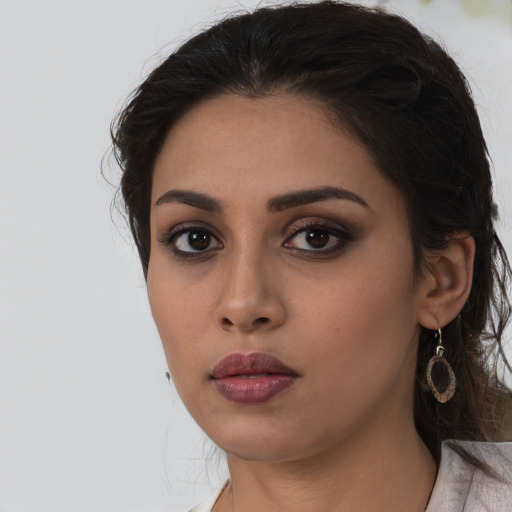 Neutral white young-adult female with medium  brown hair and brown eyes