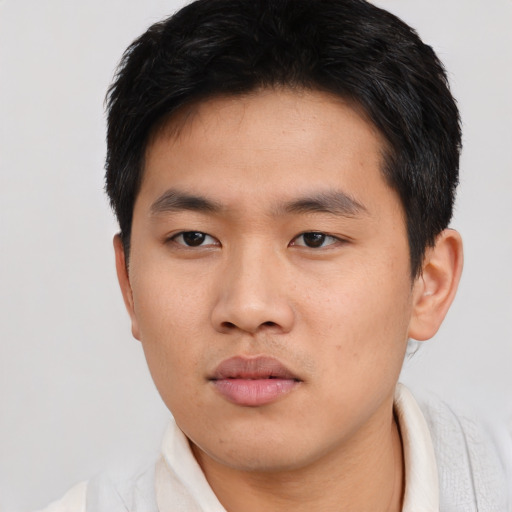 Neutral asian young-adult male with short  black hair and brown eyes