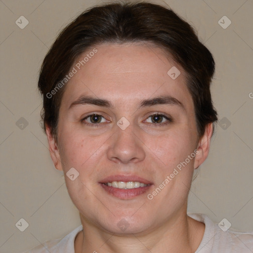 Joyful white young-adult female with short  brown hair and brown eyes