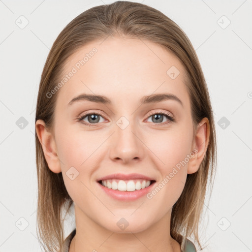 Joyful white young-adult female with long  brown hair and grey eyes