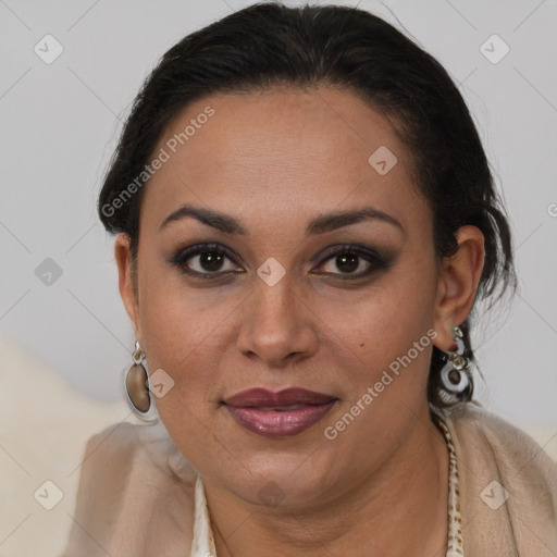 Joyful latino young-adult female with long  brown hair and brown eyes