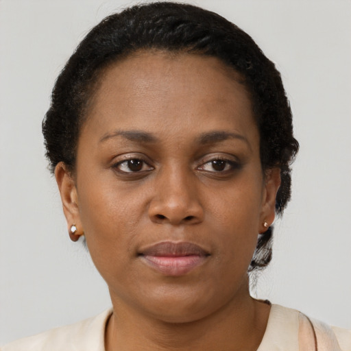 Neutral black young-adult female with short  brown hair and brown eyes