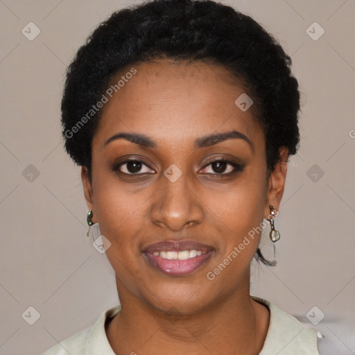 Joyful black young-adult female with short  black hair and brown eyes
