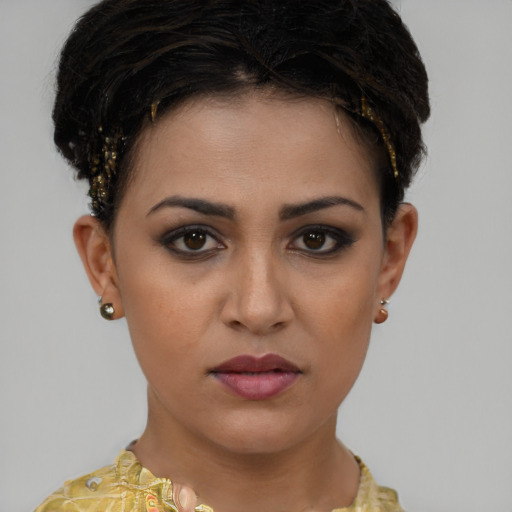 Neutral white young-adult female with short  brown hair and brown eyes