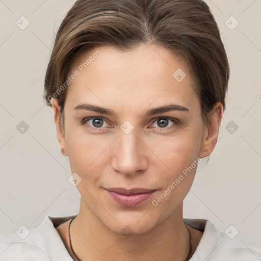 Joyful white young-adult female with short  brown hair and grey eyes