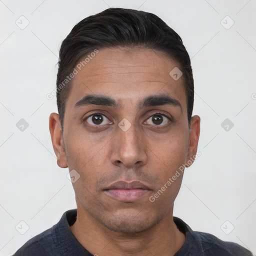 Neutral white young-adult male with short  black hair and brown eyes