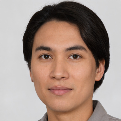 Neutral asian young-adult male with short  black hair and brown eyes