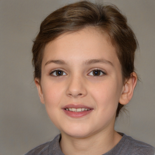 Joyful white child female with medium  brown hair and brown eyes