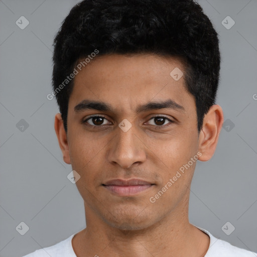 Neutral latino young-adult male with short  black hair and brown eyes