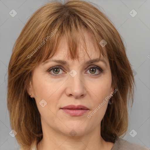 Joyful white adult female with medium  brown hair and grey eyes