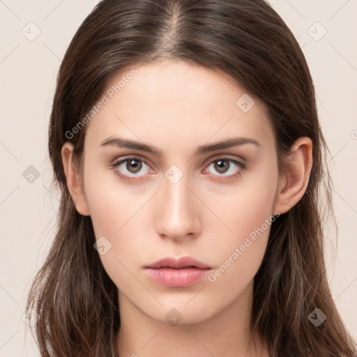 Neutral white young-adult female with long  brown hair and brown eyes